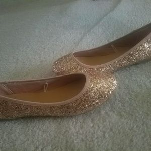 Golden glitter flats.